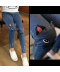 Dívčí jeansy s kočičkami na kolenech